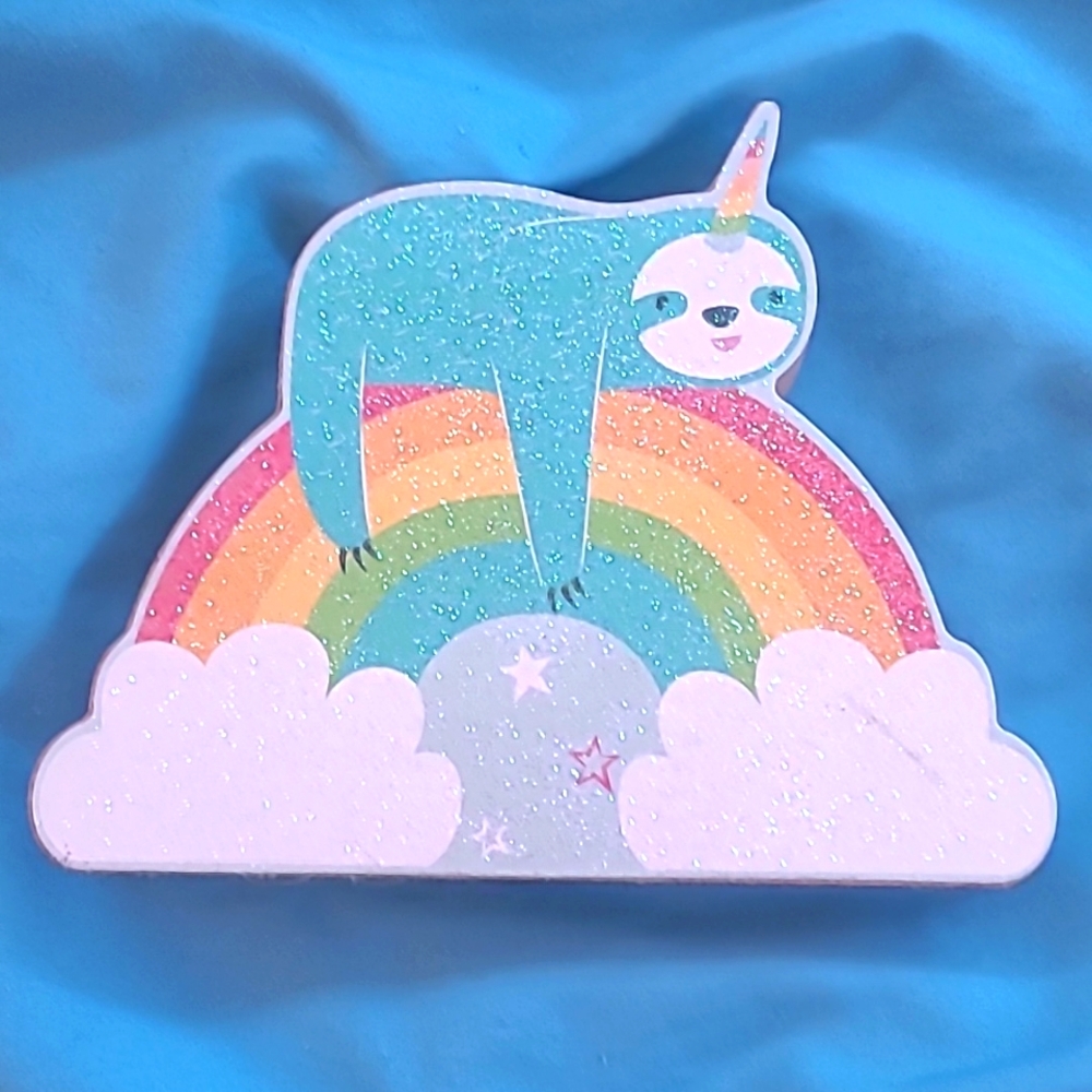 Cute unicorn sloth on rainbow kids room decor
